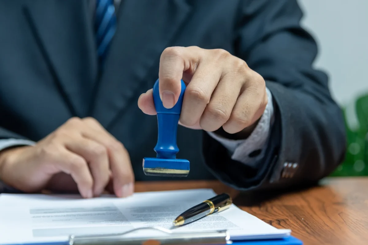 Professional stamping pharmaceutical documents for international authentication through apostille or consular legalization.