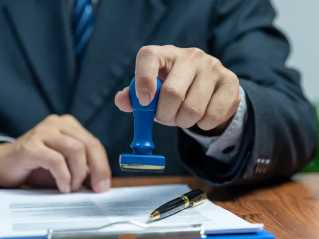 Professional stamping pharmaceutical documents for international authentication through apostille or consular legalization.